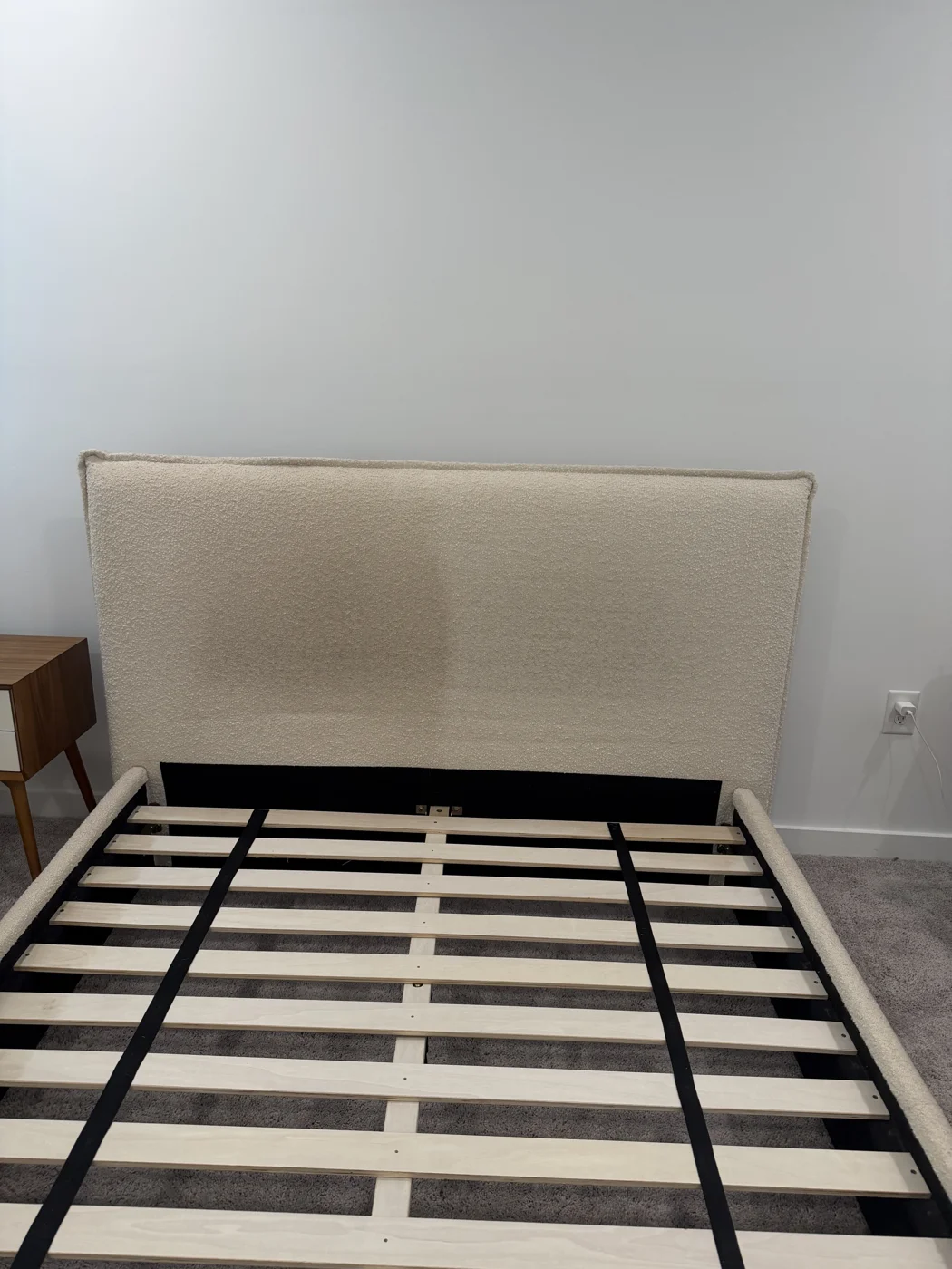 Queen bouclé bed frame cleaning project in Decatur — headboard detail