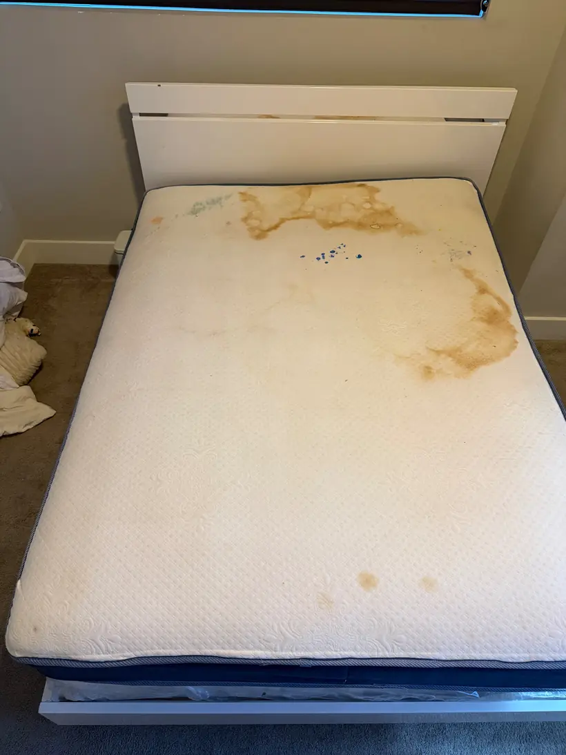 Mattress with heavy urine, juice and paint stains before cleaning in Buckhead Atlanta GA